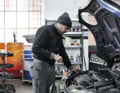 A man repairing auto
